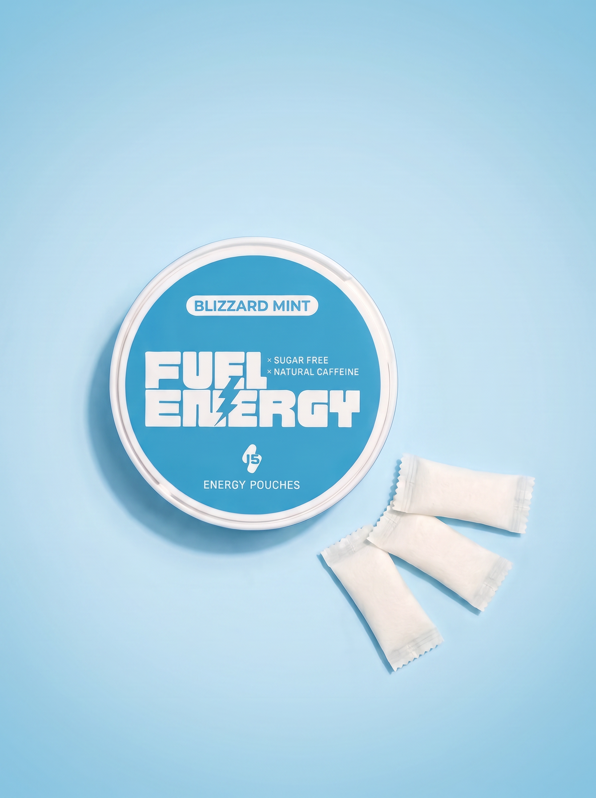 FUEL Energy Blizzard Mint caffeine pouch tin — overhead flat-lay with three pouches